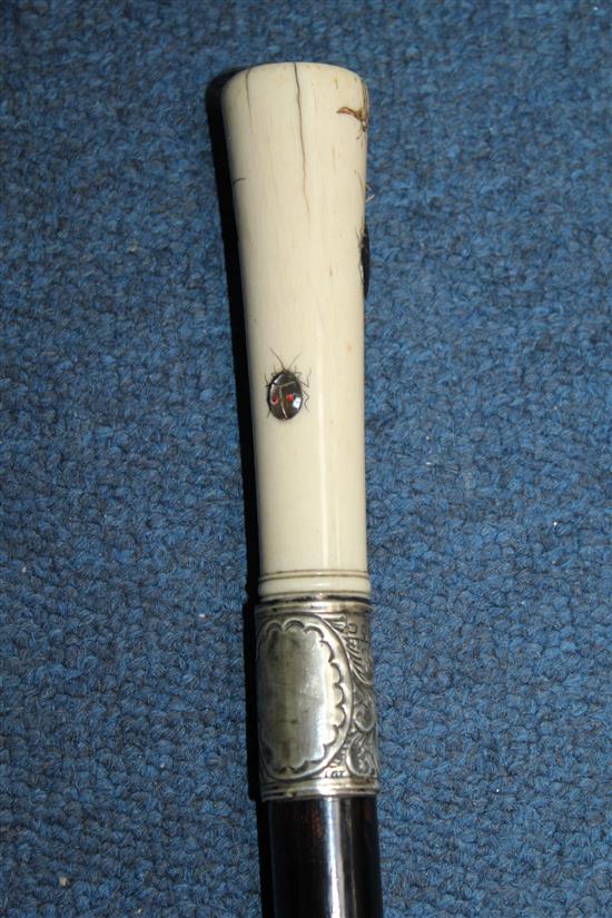 A late Victorian ebonised walking cane, 36in.